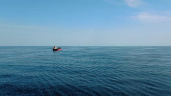 A large ship for transporting bulk cargo across the ocean.