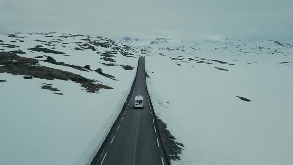 Drone Shot of Camper RV on Winter Mountain Road