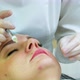 The Cosmetologist Makes Injections on the Client's Face in the Lip Area - VideoHive Item for Sale