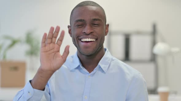 Portrait African Man Waving Welcoming Office