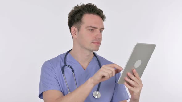 Young Doctor Using Digital Tablet on White Background