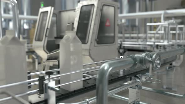 White beverage carton product packages moving on the factory manufacturing belt alt