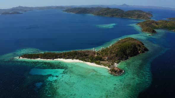 Aerial view of Malcapuya Beach island in a sunny day, Coron, Palawan, Philippines