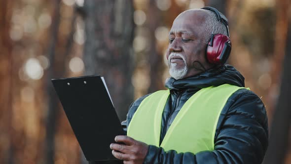 Closeup African American Male Professional Foreman Forestry Engineer Standing Outdoors Wearing