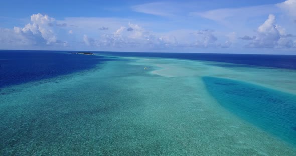 Natural birds eye tourism shot of a paradise sunny white sand beach and aqua blue ocean background i