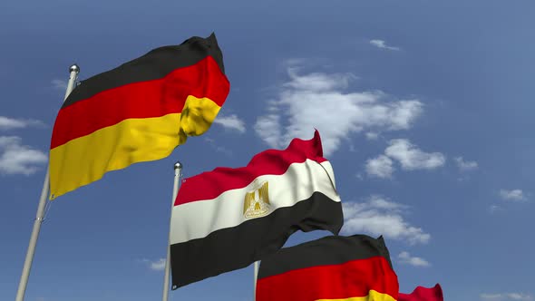 Flags of Egypt and Germany Against Blue Sky