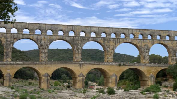 People Cross the Bridge of Pont Du Gard in Southern France, the Highest and One the Best Preserved