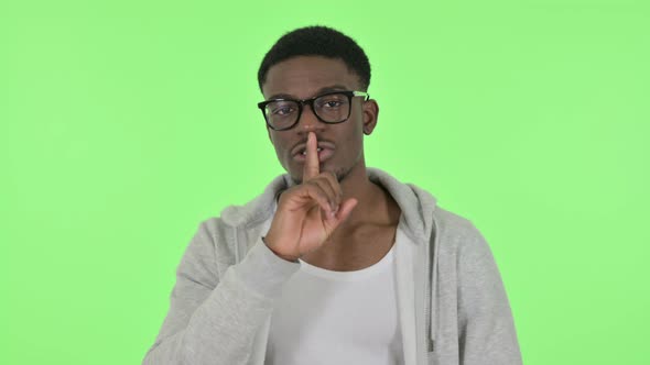 African Man with Finger on Lips Silence Green Screen