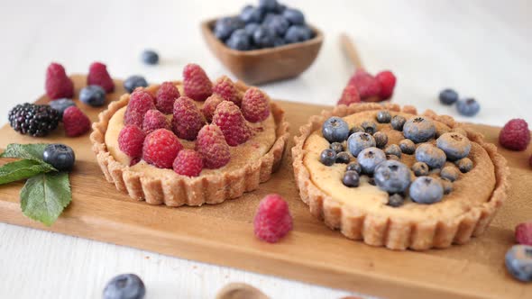 Tartlets With Fresh Berries On Table.