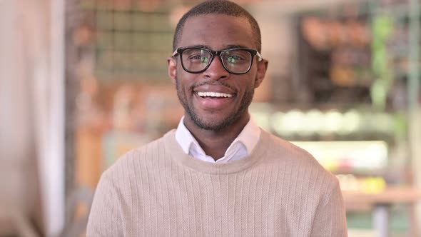 Portrait of Smiling African Man Looking at Camera