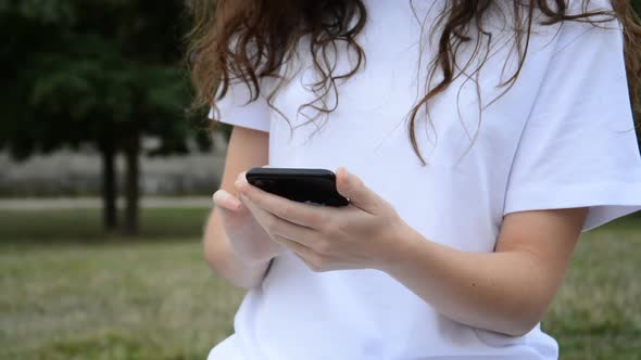 Hand of Woman Using Smart Phone