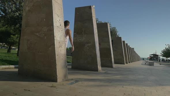 Young Parkour Tracer Making Wallflip