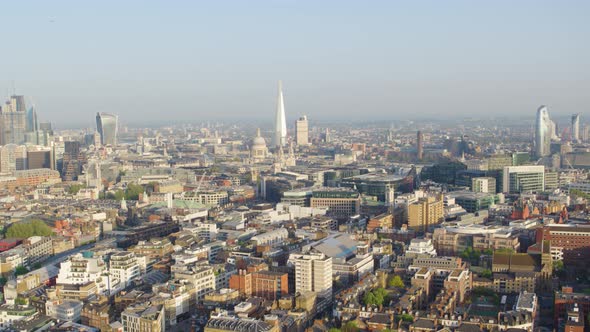 Wide pan left view aerial establishing shot of London