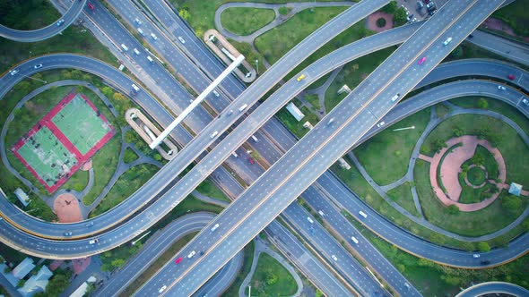 4K : Time lapse Aerial view and top view of traffic on city. Expressway with car lots