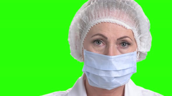 Close Up Female Doctor in Surgical Hat and Mask.