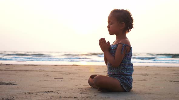 Cute Little Child Girl Playing Drums on Sandy Beach