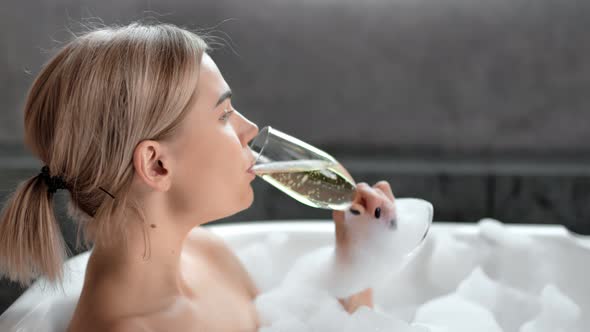 Closeup Adorable Smiling Young Woman Relaxing Taking Bath Drinking Champagne Side View