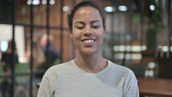 Yes, African Woman Shaking Head in Acceptance