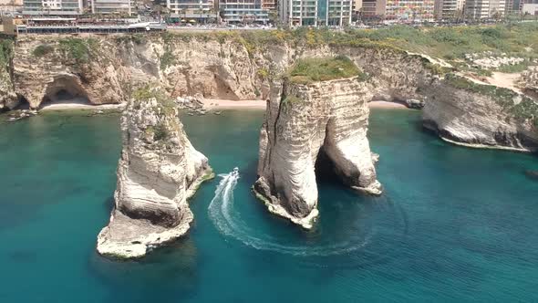 Overtake shot Of Big Pigeon Rocks In Rawshe Coastline, Beirut City , Lebanon