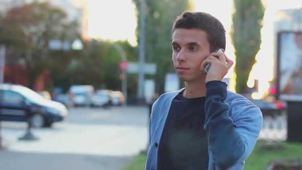 Man Calls Dials Number No Answer Serious Young Male Outdoors Day