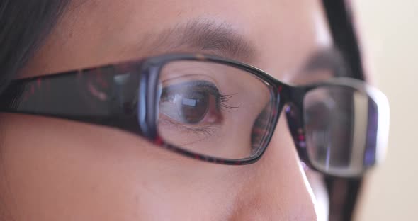 Close up of woman looking at computer