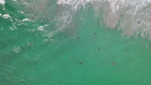 Aerial Drone Footage of Surfers, Trigg Beach, Perth, Western Australia at sunset