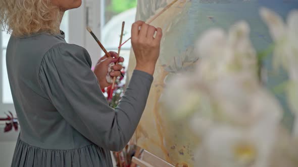 Woman Artist of Drawings Preparing to Create a Abstract Painting Image