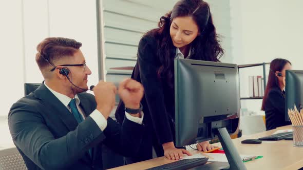 Business People Wearing Headset Working in Office