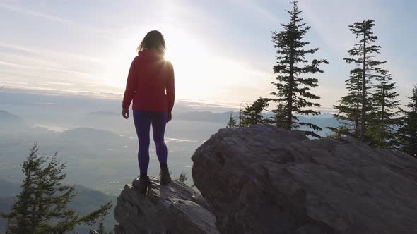 Adventurous Caucasian Adult Woman Hiking in Canadian Nature