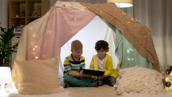 Little Boys with Tablet Pc in Kids Tent at Home