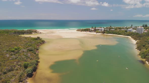 Aerial drone view of beach at Currimundi Lake, Caloundra, Sunshine Coast, Queensland, Australia