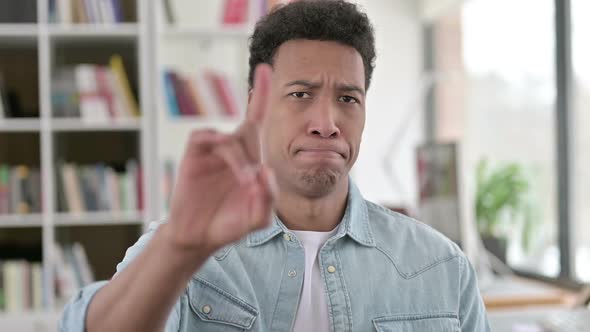 No Young African American Man Disapproving By Finger Sign