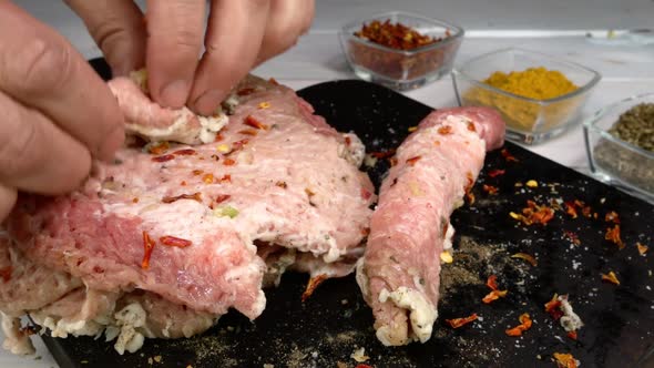 Cook Wrap Meat Rolls of Fresh Raw Pork Fillet on Kitchen Board Cooking Tasty Food