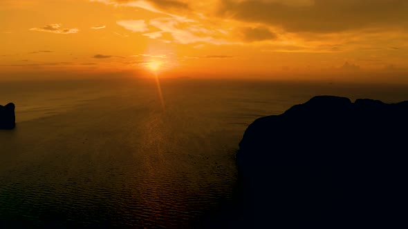 The panorama of the Phi Phi Islands, Krabi Province, Thailand/Thai. Spectacular color sunset over th