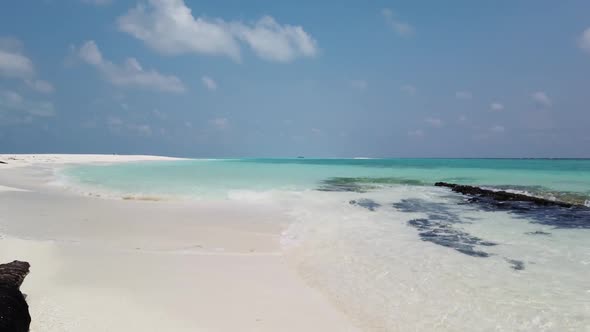 Aerial drone view tourism of idyllic shore beach voyage by blue sea and white sand background of a d