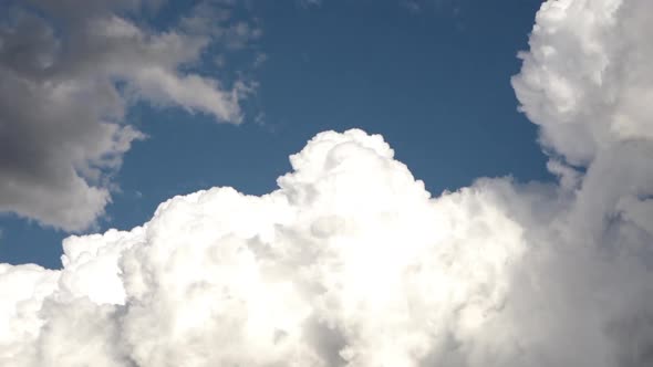 UK August 2018. Time lapse of rolling bilious cloud formations following a torrential rain storm.