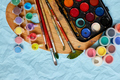 Flat lay of colorful paints, painting palette and brushes - PhotoDune Item for Sale