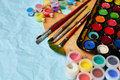 Flat lay of colorful paints, painting palette and brushes - PhotoDune Item for Sale