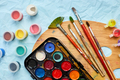 Flat lay of colorful paints, painting palette and brushes - PhotoDune Item for Sale
