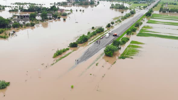 Flooded Highway. Flooded Road During Floods. Cars That Can Not Pass on the Road Flooded River.