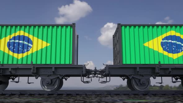 Containers with the flag of Brazil. Railway transportation