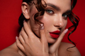 Beautiful woman with perfect skin on red background. Beauty and skin care concept. - PhotoDune Item for Sale