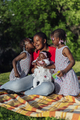 African family kissing in the park - PhotoDune Item for Sale