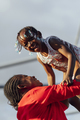 African mother playing with her daughter outdoors - PhotoDune Item for Sale