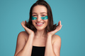 Smiling woman with eye patches - PhotoDune Item for Sale