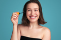 Smiling woman with mascara brush - PhotoDune Item for Sale