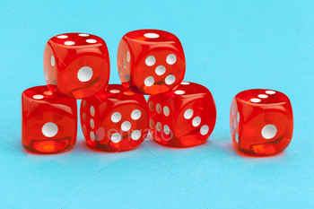 Gaming dices on blue background. Game concept.