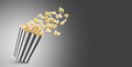 Popcorn Flying Out Of Black White Striped Paper Box, Isolated On Black Background - PhotoDune Item for Sale