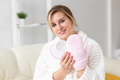 Woman hand holding massage sponge - spa and body care concept - PhotoDune Item for Sale