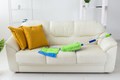 Blue and green plastic mop with adjustable handle lying on couch - tools for cleaning services and - PhotoDune Item for Sale